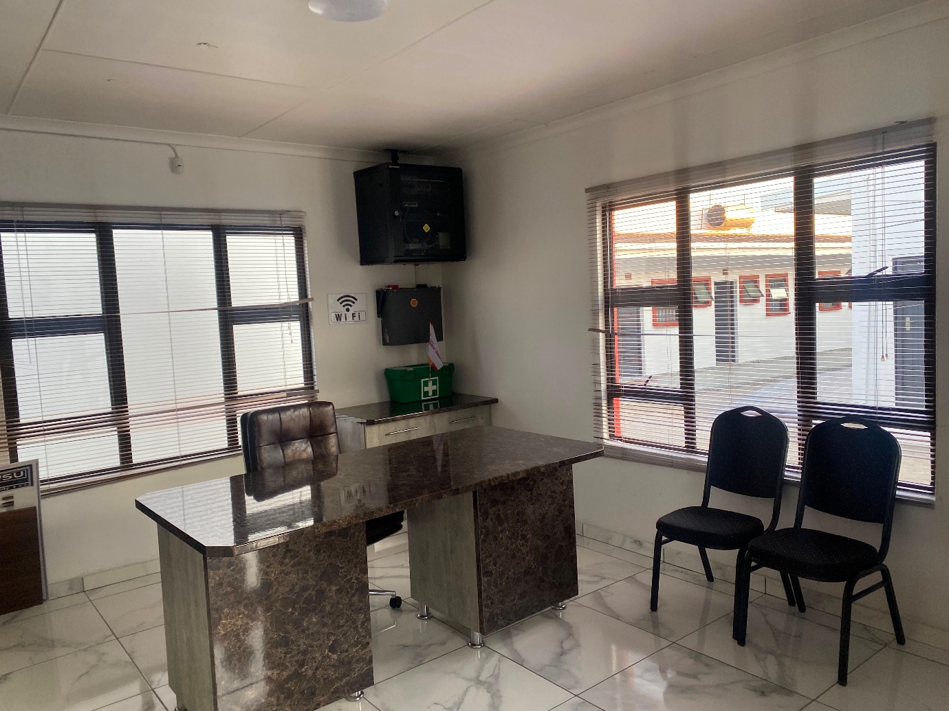 Office with Wi-Fi point and seating for visitors